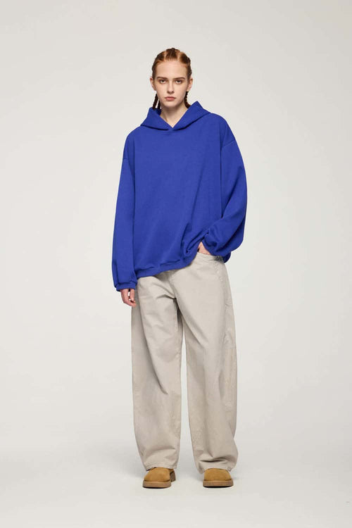 Drop-Shoulder Rib-Trim Pullover Hoodie in Colorful Blue - full-length front modeled view