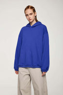 Drop-Shoulder Rib-Trim Pullover Hoodie in Colorful Blue - front modeled view