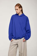 Drop-Shoulder Rib-Trim Pullover Hoodie in Colorful Blue - front modeled view
