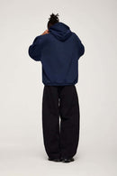 Drop-Shoulder Rib-Trim Pullover Hoodie in Royal Blue - back modeled view