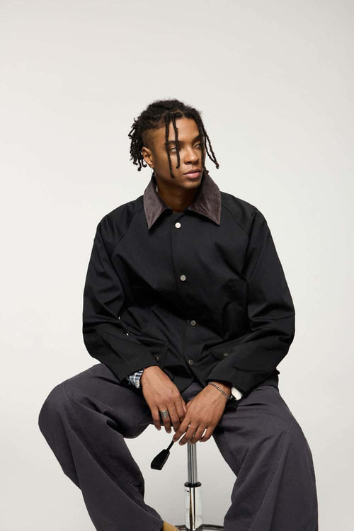 Wrinkle-Resistant Corduroy-Collar Utility Jacket in Black - front modeled view