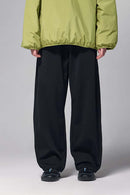 4-Way Stretch Thermal-Fleece Straight-Leg Sweatpants in Black - front modeled view