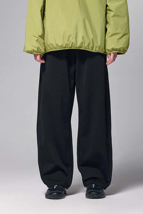 4-Way Stretch Thermal-Fleece Straight-Leg Sweatpants in Black - front modeled view