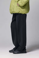 4-Way Stretch Thermal-Fleece Straight-Leg Sweatpants in Black - three-quarter front modeled view