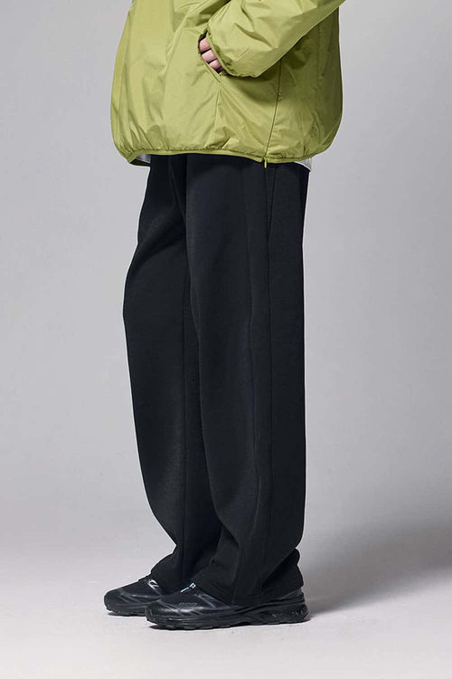 4-Way Stretch Thermal-Fleece Straight-Leg Sweatpants in Black - three-quarter front modeled view