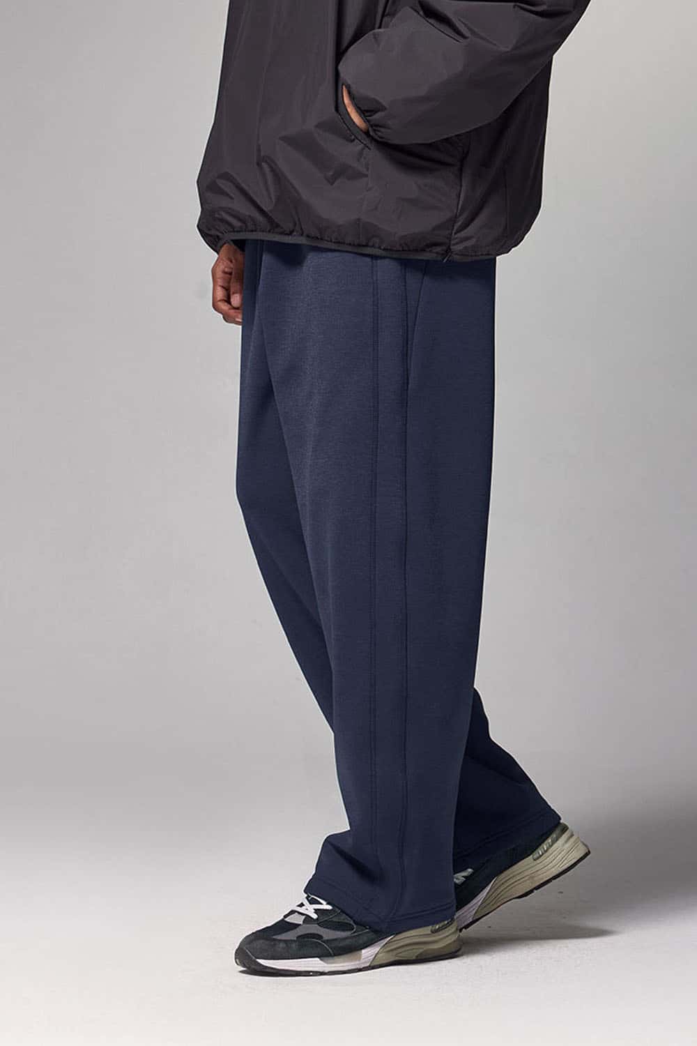 4-Way Stretch Thermal-Fleece Straight-Leg Sweatpants in Eclipse Blue - three-quarter front modeled view