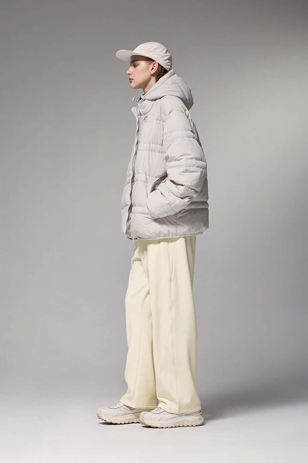 4-Way Stretch Thermal-Fleece Straight-Leg Sweatpants in White - three-quarter front modeled view