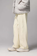 4-Way Stretch Thermal-Fleece Straight-Leg Sweatpants in White - three-quarter front modeled view