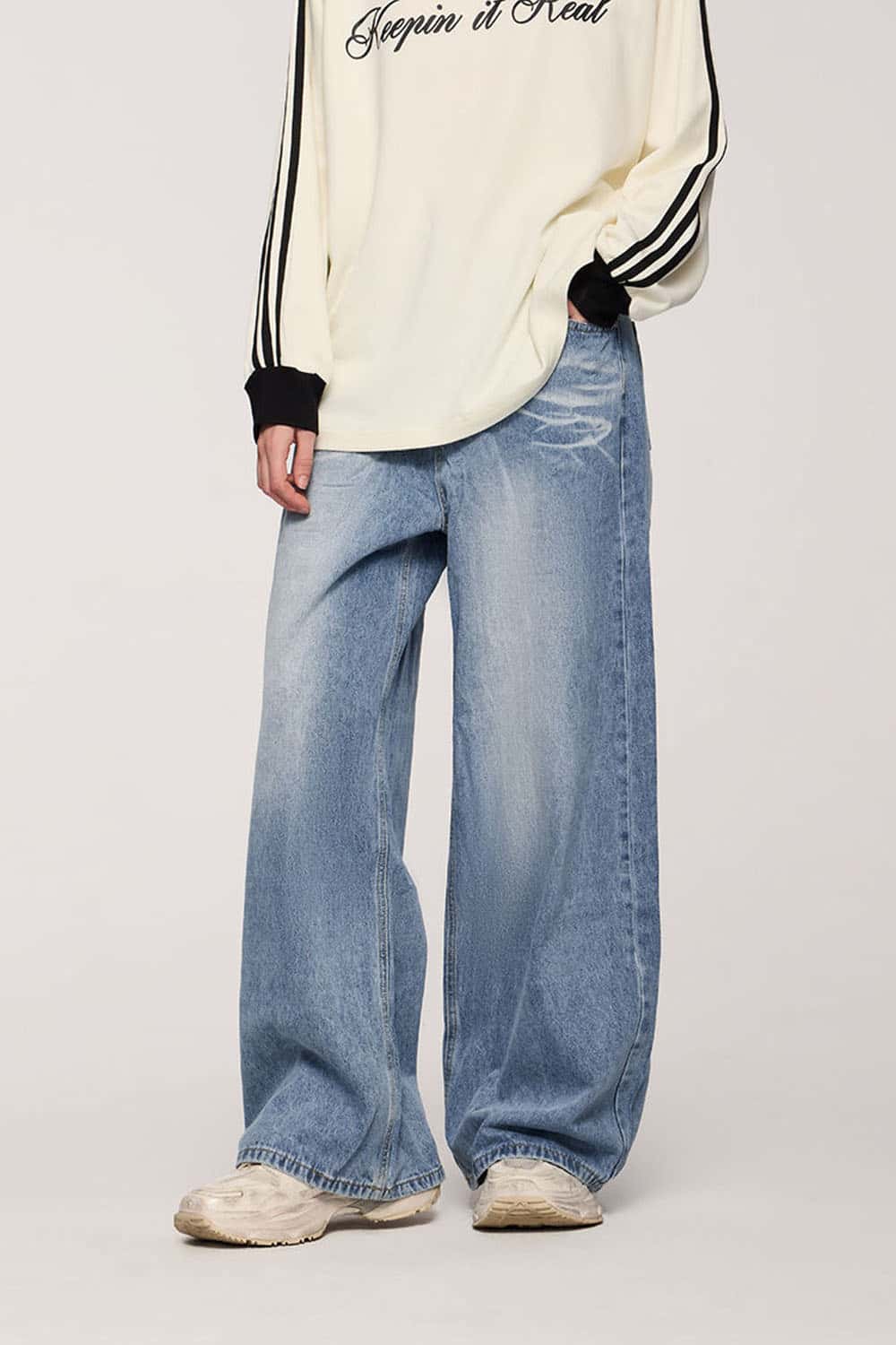 Washed Five-Pocket Wide Straight-Leg Denim Pants in Baby Blue - front modeled close-up