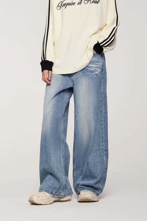 Washed Five-Pocket Wide Straight-Leg Denim Pants in Baby Blue - front modeled close-up