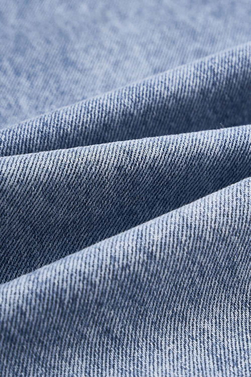 Washed Five-Pocket Wide Straight-Leg Denim Pants in Baby Blue - fabric texture close-up