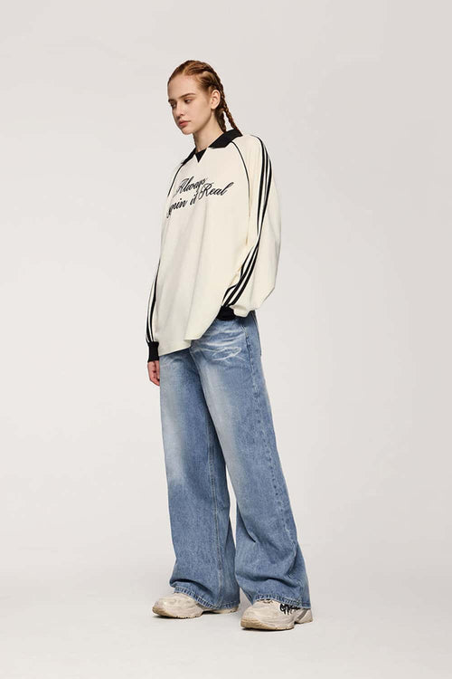 Washed Five-Pocket Wide Straight-Leg Denim Pants in Baby Blue - full-length front modeled view