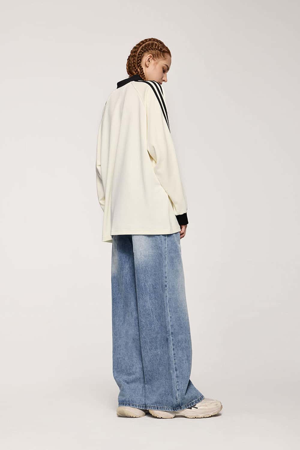 Washed Five-Pocket Wide Straight-Leg Denim Pants in Baby Blue - full-length back modeled view