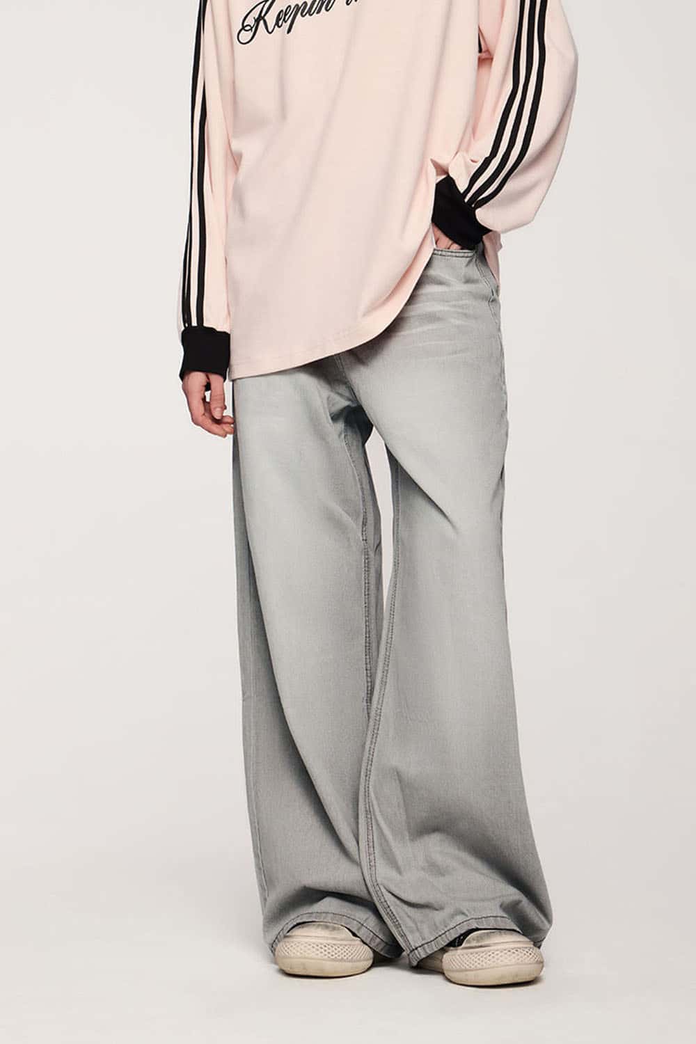 Washed Five-Pocket Wide Straight-Leg Denim Pants in Light Gray - front modeled close-up
