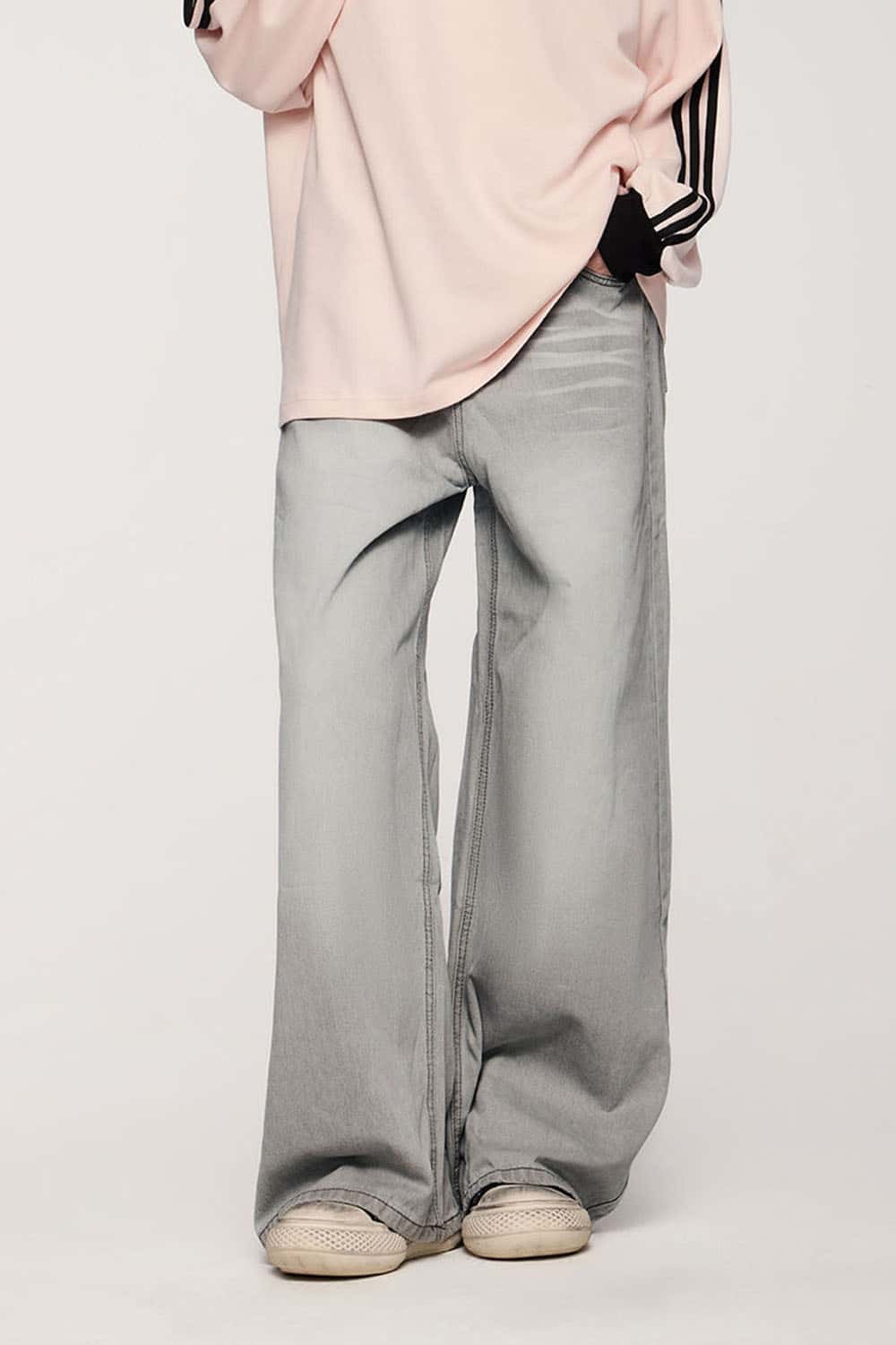 Washed Five-Pocket Wide Straight-Leg Denim Pants in Light Gray - full-length modeled view