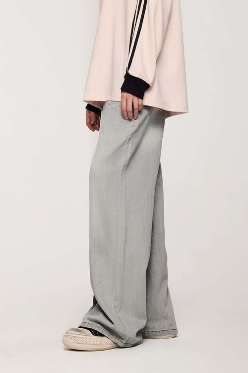 Washed Five-Pocket Wide Straight-Leg Denim Pants in Light Gray - side modeled view