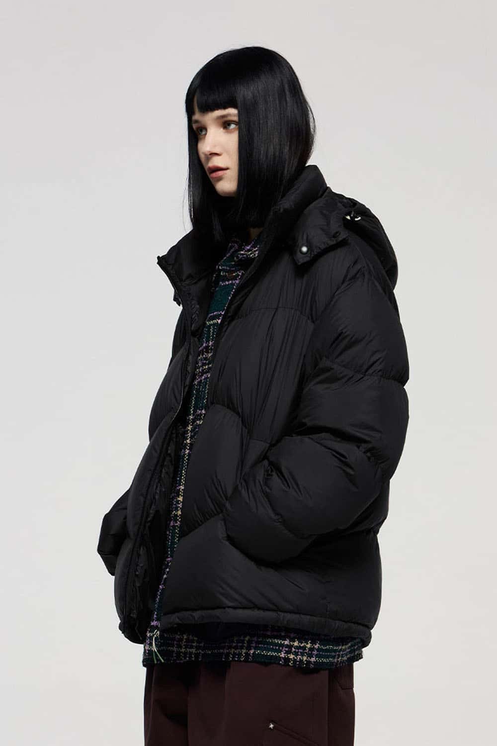 Packable White Duck Down Hooded Puffer Jacket in Black - product detail close-up
