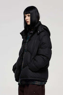 Packable White Duck Down Hooded Puffer Jacket in Black - product detail close-up