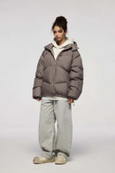 Packable White Duck Down Hooded Puffer Jacket in Brown - full-length front modeled view