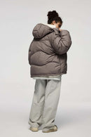 Packable White Duck Down Hooded Puffer Jacket in Brown - full-length back modeled view