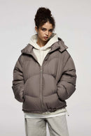 Packable White Duck Down Hooded Puffer Jacket in Brown - front modeled view