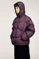 Packable White Duck Down Hooded Puffer Jacket in Burgundy - front modeled view