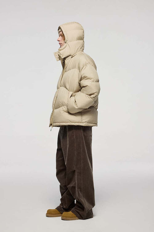 Packable White Duck Down Hooded Puffer Jacket in Khaki - full-length side modeled view