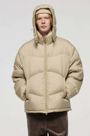 Packable White Duck Down Hooded Puffer Jacket in Khaki - front modeled view