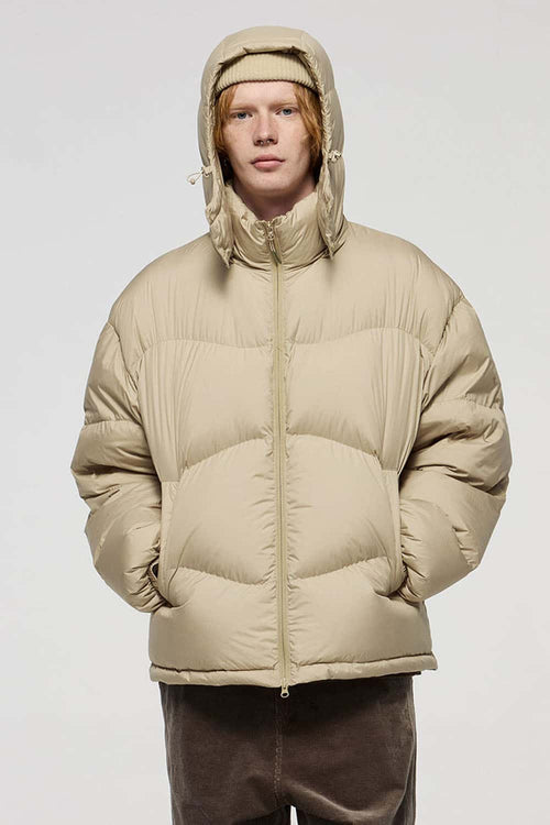 Packable White Duck Down Hooded Puffer Jacket in Khaki - front modeled view