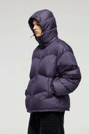 Packable White Duck Down Hooded Puffer Jacket in Purple - front modeled view