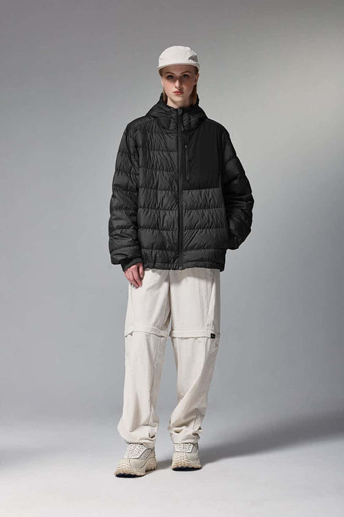 Waterproof White Duck Down Hooded Puffer Jacket in Black - full-length front modeled view