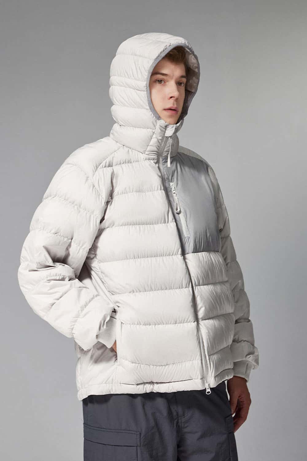 Waterproof White Duck Down Hooded Puffer Jacket in Grayish White - front modeled view
