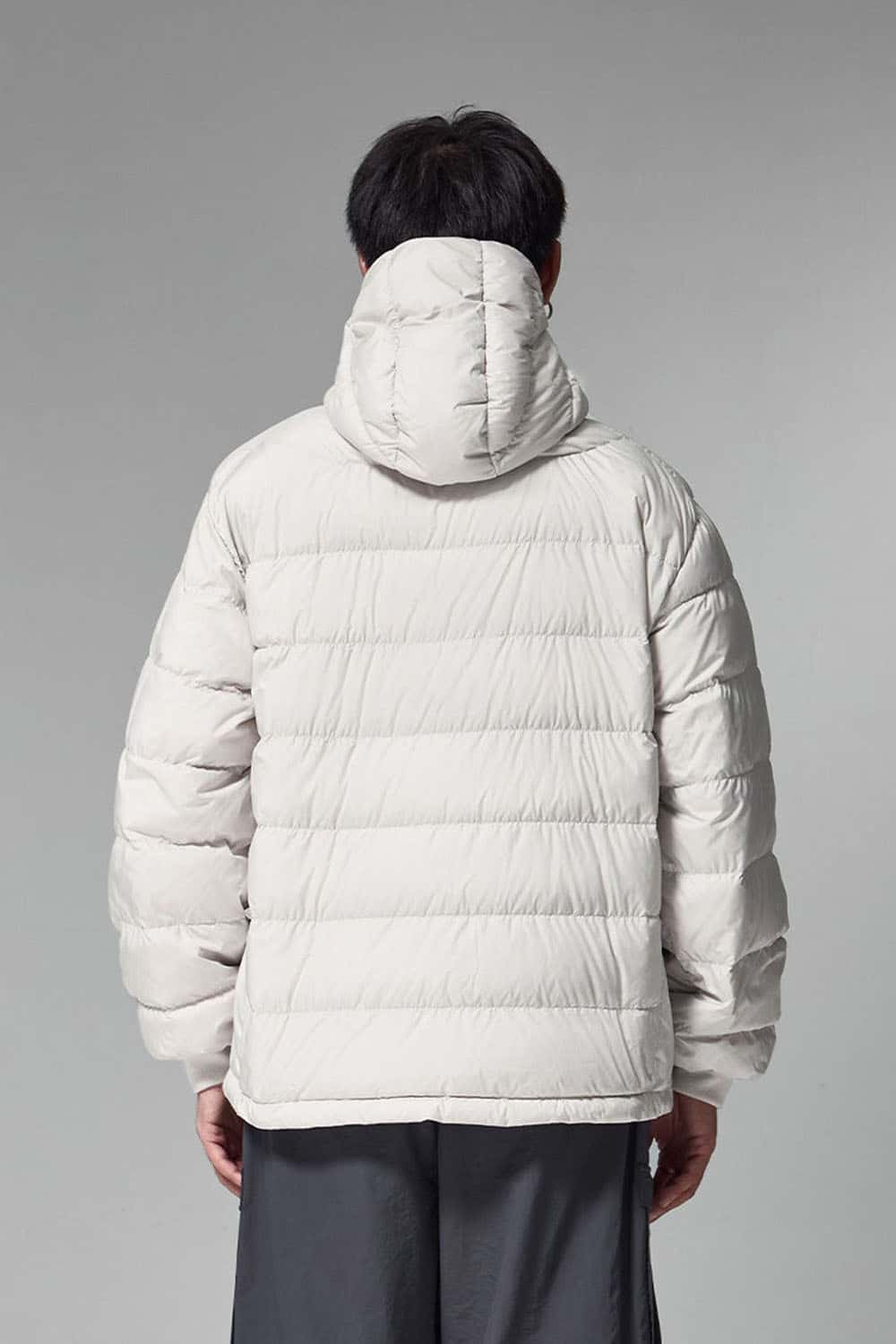 Waterproof White Duck Down Hooded Puffer Jacket in Grayish White - back modeled close-up