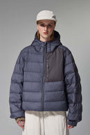 Waterproof White Duck Down Hooded Puffer Jacket in Purple - front modeled close-up