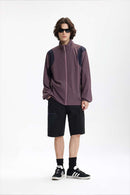 Panelled Windproof Stand-Collar Cycling Jacket in Vintage Purple - full-length front modeled view