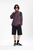 Panelled Windproof Stand-Collar Cycling Jacket in Vintage Purple - full-length front modeled view