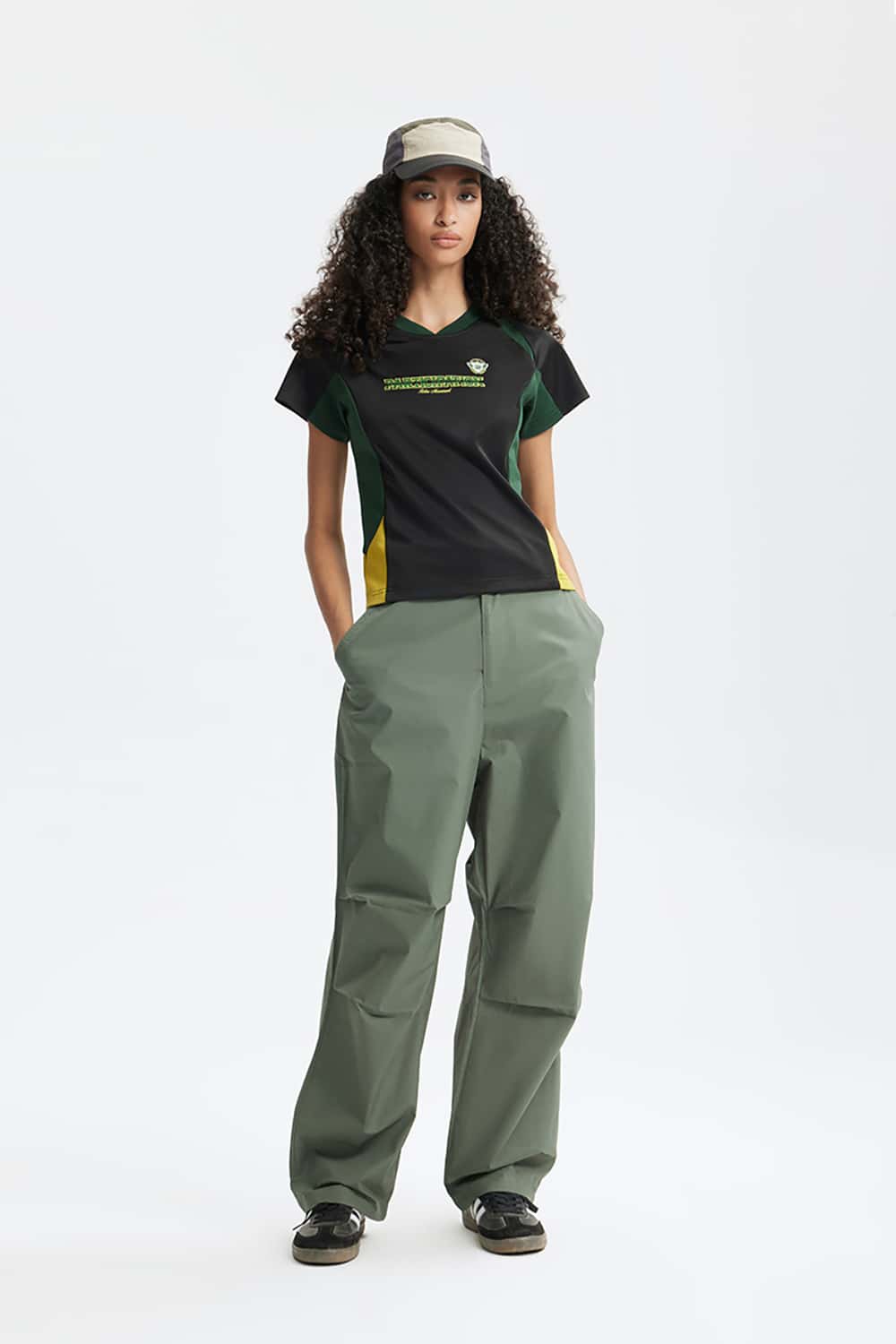 Graphic Color-Block Raglan-Sleeve Sporty T-Shirt in Black - full-length front modeled view