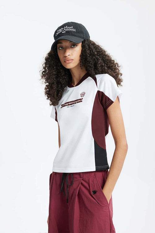 Graphic Color-Block Raglan-Sleeve Sporty T-Shirt in White - front modeled close-up