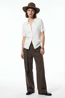 Button-Front Short-Sleeve Knit Shirt in White - full-length front modeled view