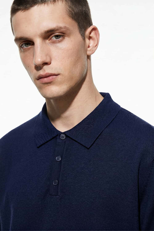 Relaxed Cotton Knit Polo Shirt in Navy Blue - front modeled view
