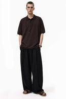 Relaxed Cotton Knit Polo Shirt in Reddish Brown - full-length front modeled view