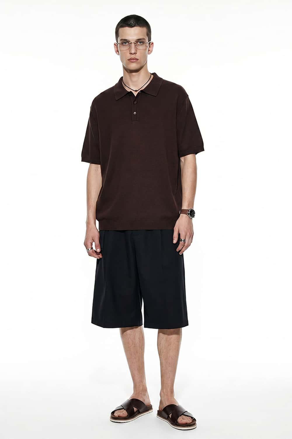 Relaxed Cotton Knit Polo Shirt in Reddish Brown - full-length front modeled view