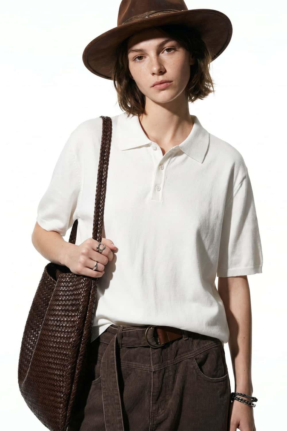 Relaxed Cotton Knit Polo Shirt in White - front modeled view