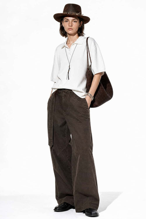 Relaxed Cotton Knit Polo Shirt in White - full-length front modeled view