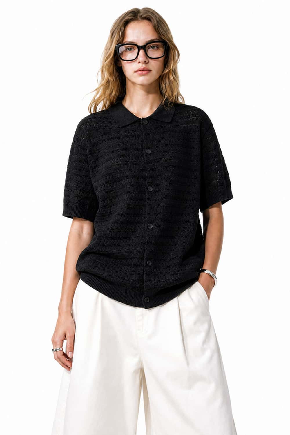 Short-Sleeve Knit Cardigan with Openwork Bands in Black - full-length front modeled view