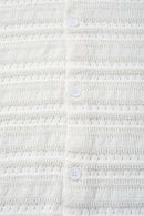 Short-Sleeve Knit Cardigan with Openwork Bands in White - fabric texture close-up