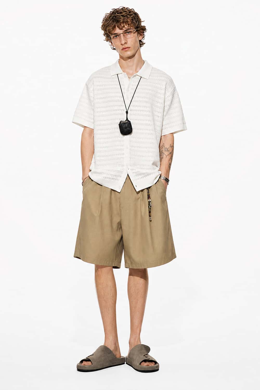 Short-Sleeve Knit Cardigan with Openwork Bands in White - full-length front modeled view