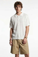 Short-Sleeve Knit Cardigan with Openwork Bands in White - full-length front modeled view