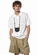 Short-Sleeve Knit Cardigan with Openwork Bands in White - full-length front modeled view