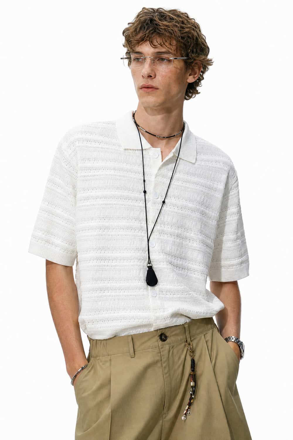 Short-Sleeve Knit Cardigan with Openwork Bands in White - full-length front modeled view